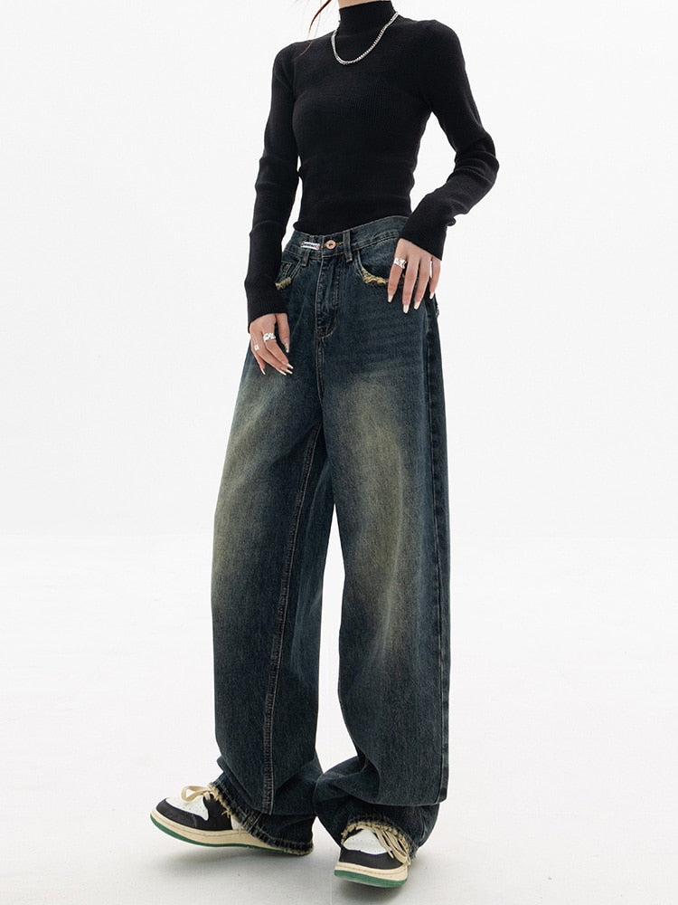 "Damen Vintage Baggy Jeans in Blau, hoher Bund, weiter Schnitt, lässiger Streetwear-Stil für Komfort und Eleganz."