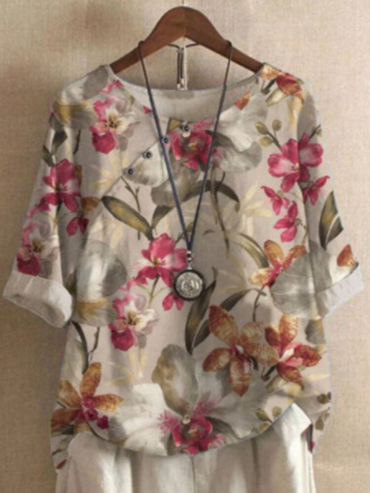 "Damenbluse mit lebhaftem Druck, vielseitig kombinierbar, stylisch und bequem, ideal für elegante und legere Anlässe."