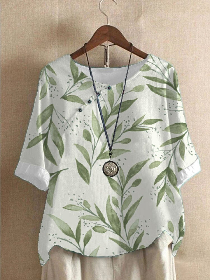 "Damenbluse mit lebhaftem Druck, vielseitig kombinierbar, stylisch und bequem, ideal für elegante und legere Anlässe."
