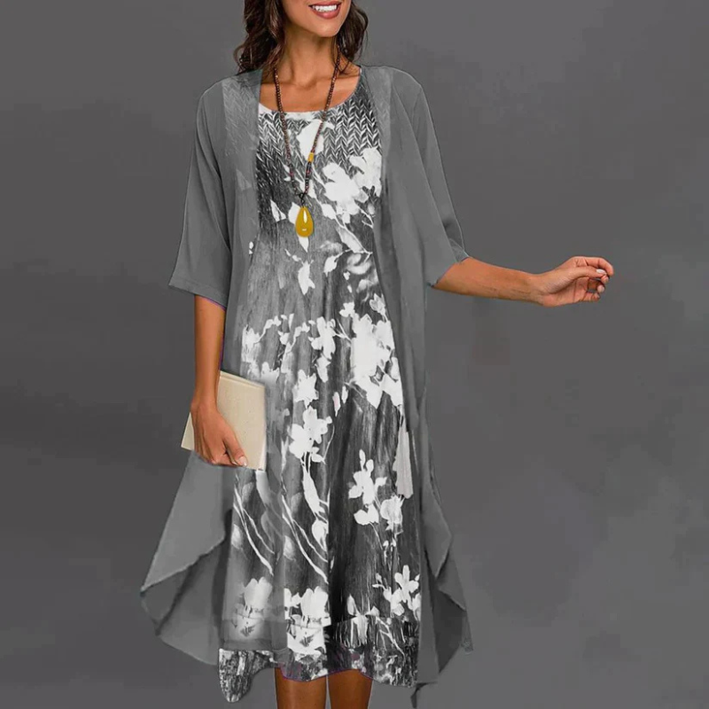 "Damenkleid mit Blumenmuster, Mini, ergänzt durch eleganten Blazer, ideal für stilvolle Anlässe und feminine Eleganz."