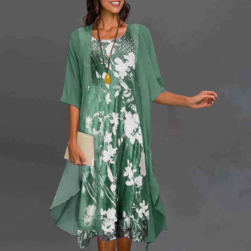 "Damenkleid mit Blumenmuster, Mini, ergänzt durch eleganten Blazer, ideal für stilvolle Anlässe und feminine Eleganz."