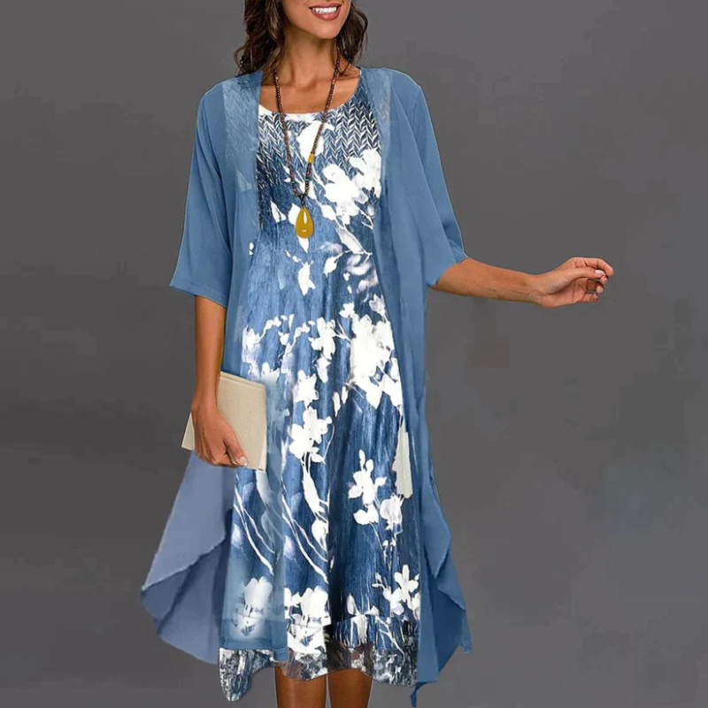 "Damenkleid mit Blumenmuster, Mini, ergänzt durch eleganten Blazer, ideal für stilvolle Anlässe und feminine Eleganz."