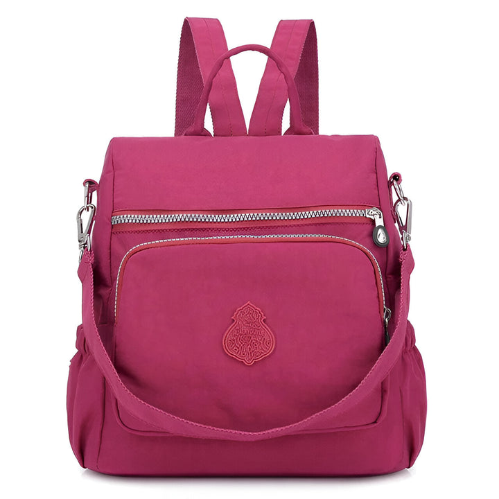 Diebstahlsicherer Damen Rucksack in Beige, wetterfest, elegante Konstruktion, versteckte Reißverschlüsse für Sicherheit.