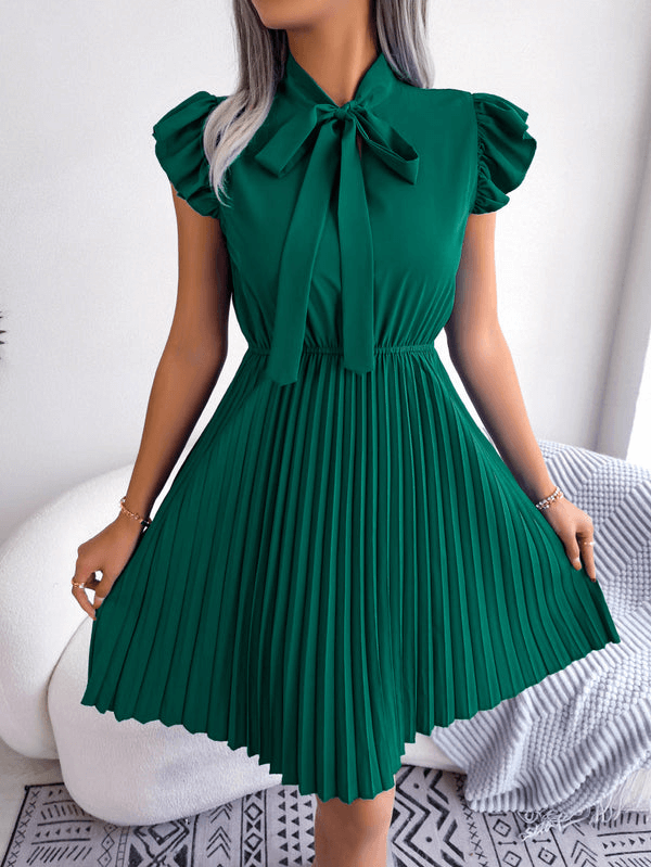 Elegantes Kleid mit Falten und Schleife