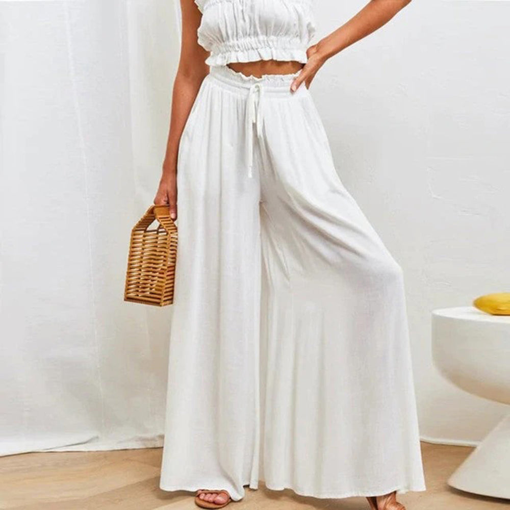 "Dunkelblaue Damenhose mit weitem Bein, elegantes Design, ideal für Sommer, hoher Tragekomfort, vielseitig kombinierbar."