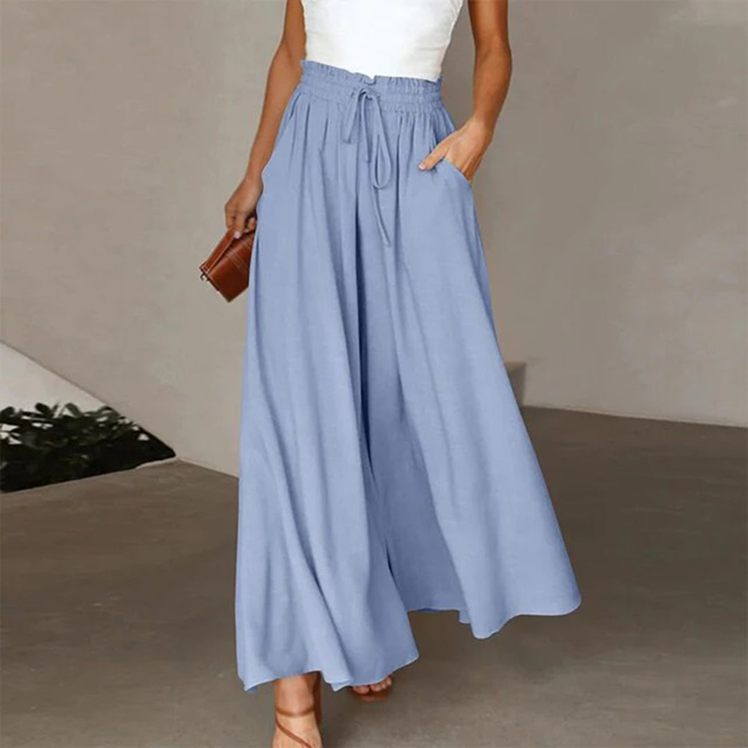 "Dunkelblaue Damenhose mit weitem Bein, elegantes Design, ideal für Sommer, hoher Tragekomfort, vielseitig kombinierbar."