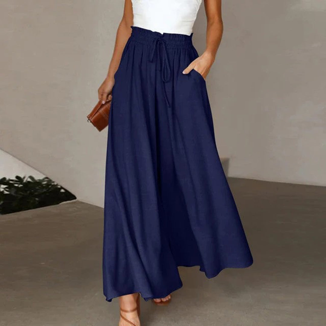 Dunkelblaue elegante Damenhose mit hoher Taille und weiter Passform, ideal für Büro und Abendessen.