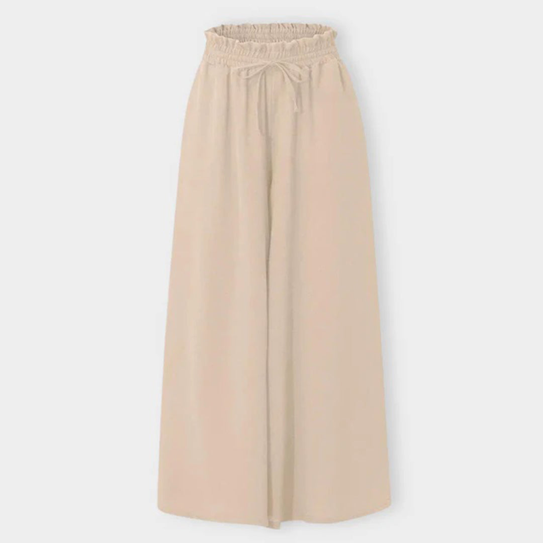 Dunkelblaue elegante Damenhose mit hoher Taille und weiter Passform, ideal für Büro und Abendessen.