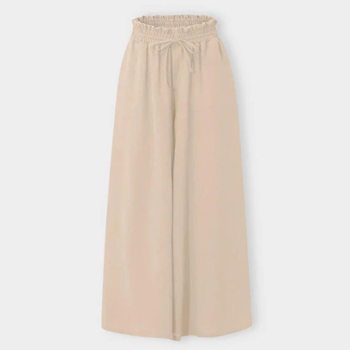Dunkelblaue elegante Damenhose mit hoher Taille und weiter Passform, ideal für Büro und Abendessen.