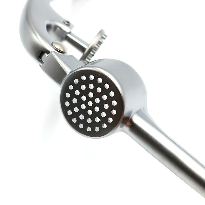 "Edelstahl Knoblauchpresse mit ergonomischem Design, ideal zum Zerdrücken von Knoblauch und Ingwer, spülmaschinenfest."