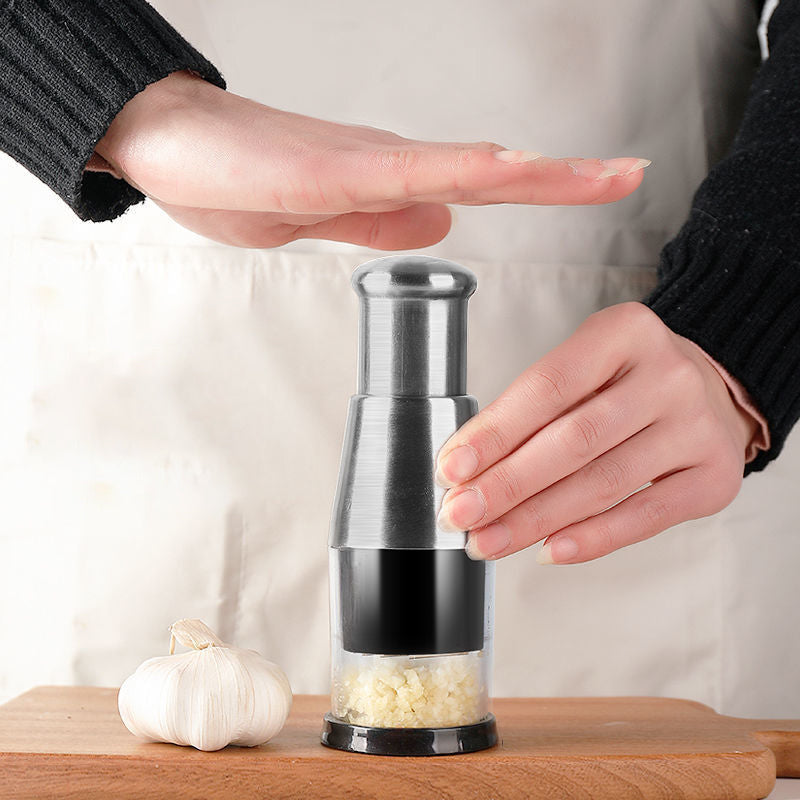 Effiziente Knoblauchpresse aus Edelstahl und Kunststoff, ergonomisch, leicht zu reinigen, kompaktes Design für die Küche.