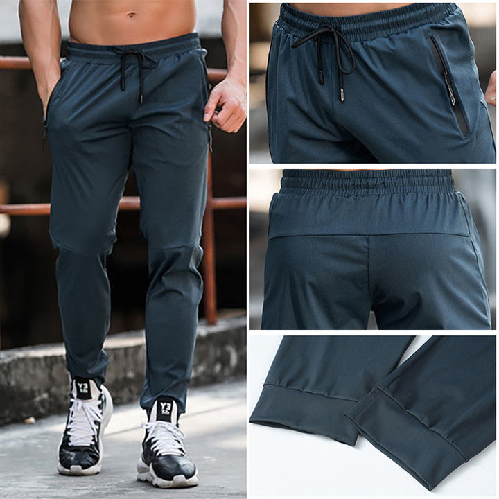 Elastische Herren Sporthose, atmungsaktiv mit Reißverschluss, ideal für Sport und Alltag, in modernem Design.