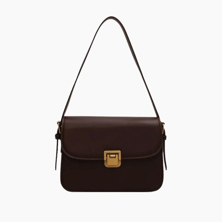 Elegante Damen-Lederhandtasche in Dunkelbraun, zeitloses Design, mit mehreren Innenfächern für eine perfekte Organisation.