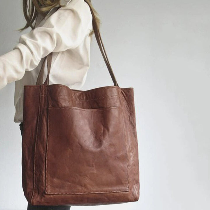 Elegante Damen Lederhandtasche, stilvoll und vielseitig, mit geräumigem Innenraum, ideal für Büro und Freizeit.