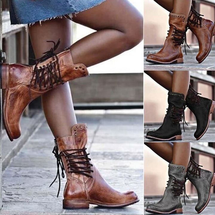Elegante Damen Lederstiefel, zeitloses Design, hoher Schaft, braunes Leder, isolierendes Futter, ideal für kalte Tage.