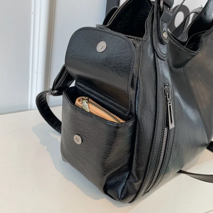 "Elegante Damen-Schultertasche aus hochwertigem Leder mit verstellbarem Gurt und stilvollem, zeitlosem Design."
