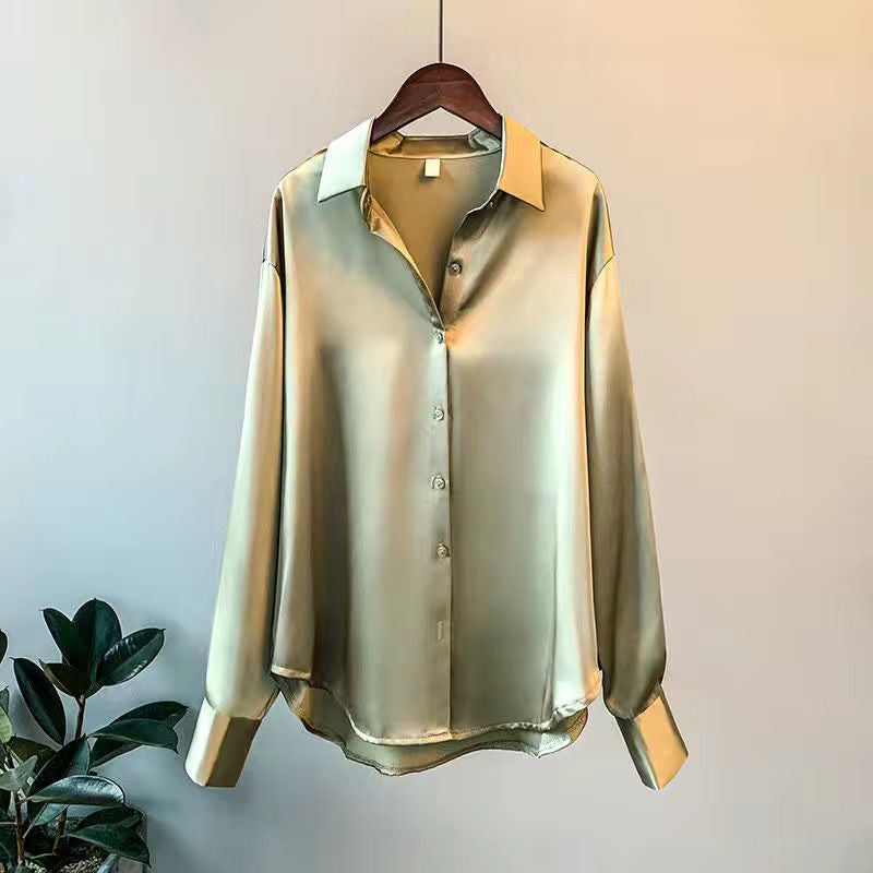 Elegante Damen-Seidenbluse in Beige, figurbetonter Schnitt, luxuriöse Qualität, ideal für Büro und Abendmode.