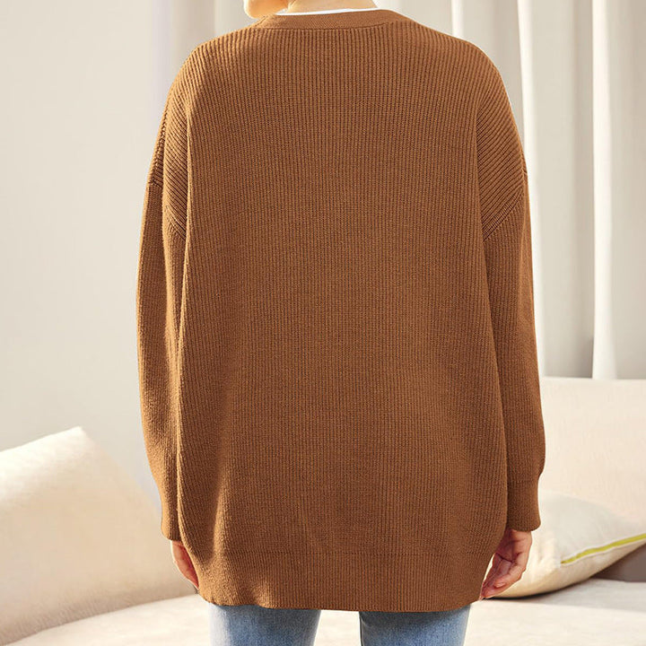 "Elegante Damen Strickjacke in beige mit feiner Struktur und langer Passform, ideal für vielseitige Alltags- und Abendlooks."