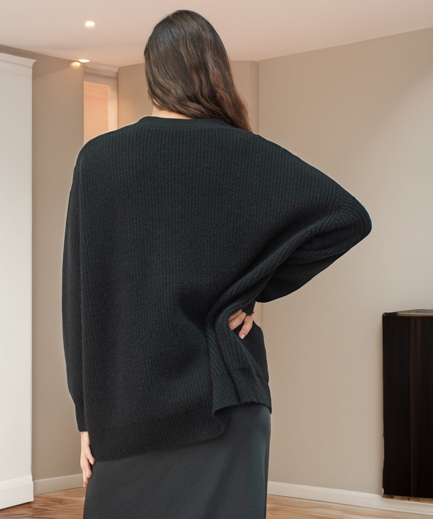 "Elegante Damen Strickjacke in beige mit feiner Struktur und langer Passform, ideal für vielseitige Alltags- und Abendlooks."