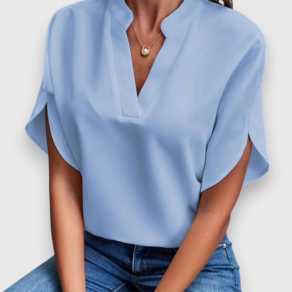 Elegante Damenbluse in Premium-Qualität, weiß mit zeitlosem Design, perfekt für Büro und Dinner, vielseitig kombinierbar.