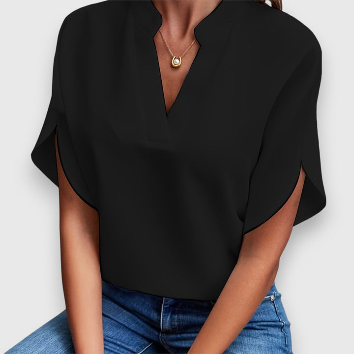 Elegante Damenbluse in Premium-Qualität, weiß mit zeitlosem Design, perfekt für Büro und Dinner, vielseitig kombinierbar.