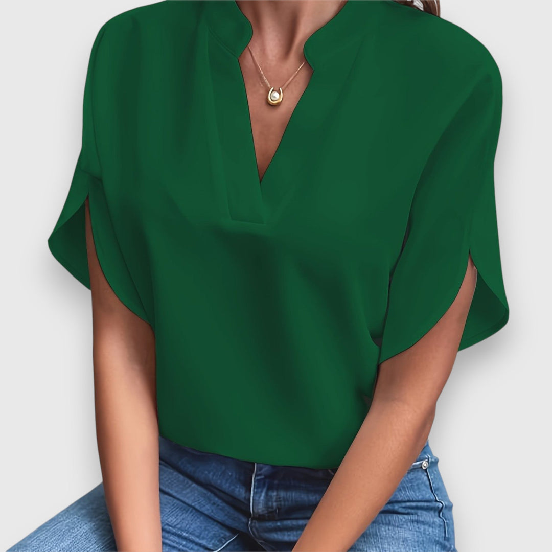 Elegante Damenbluse in Premium-Qualität, weiß mit zeitlosem Design, perfekt für Büro und Dinner, vielseitig kombinierbar.