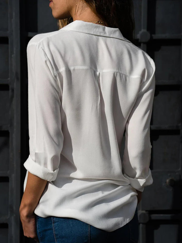 Elegante Damenbluse mit zeitlosem Design und schmeichelhafter Passform, ideal für Büro oder Abend, vielseitig kombinierbar.