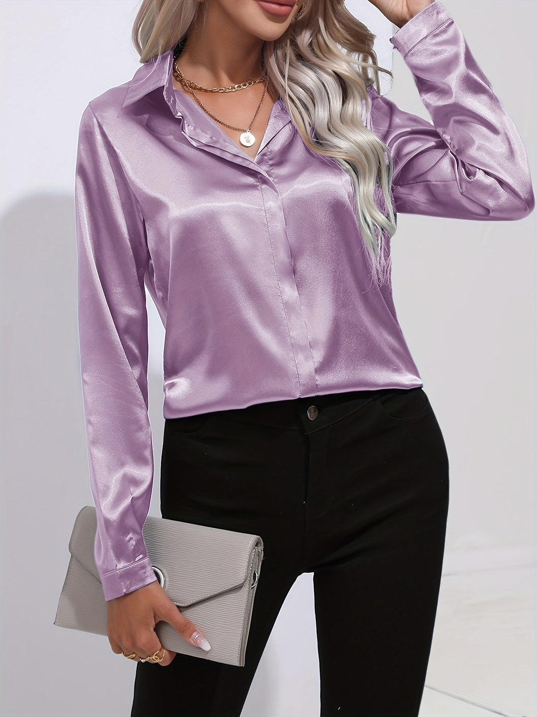 "Elegante Damenbluse, seidige Textur, vielseitiges Design, klassische Farben, ideal für Büro und Anlässe, stilvoll und bequem