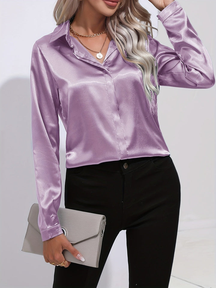 "Elegante Damenbluse, seidige Textur, vielseitiges Design, klassische Farben, ideal für Büro und Anlässe, stilvoll und bequem