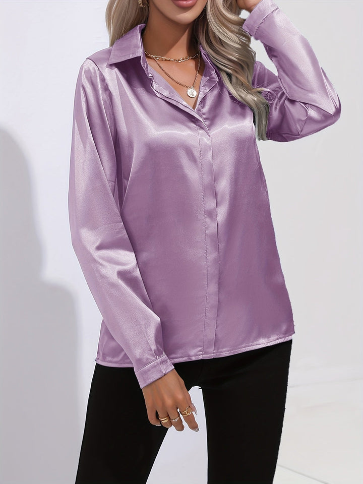 "Elegante Damenbluse, seidige Textur, vielseitiges Design, klassische Farben, ideal für Büro und Anlässe, stilvoll und bequem
