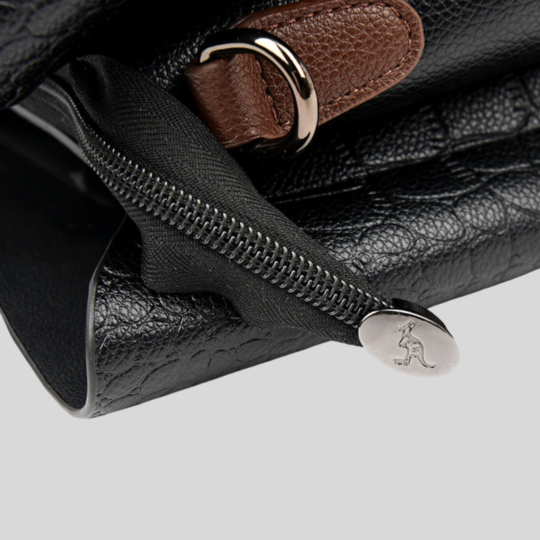 Elegante Damenhandtasche aus Leder mit verstellbarem Gurt, klassische Form, Grün und Schwarz erhältlich.