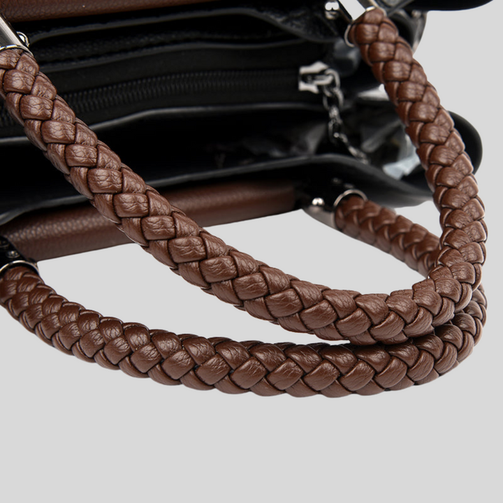 Elegante Damenhandtasche aus Leder mit verstellbarem Gurt, klassische Form, Grün und Schwarz erhältlich.