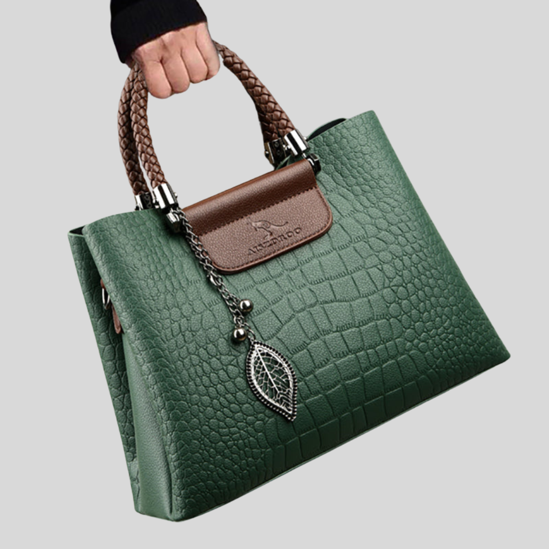 Elegante Damenhandtasche aus Leder mit verstellbarem Gurt, klassische Form, Grün und Schwarz erhältlich.