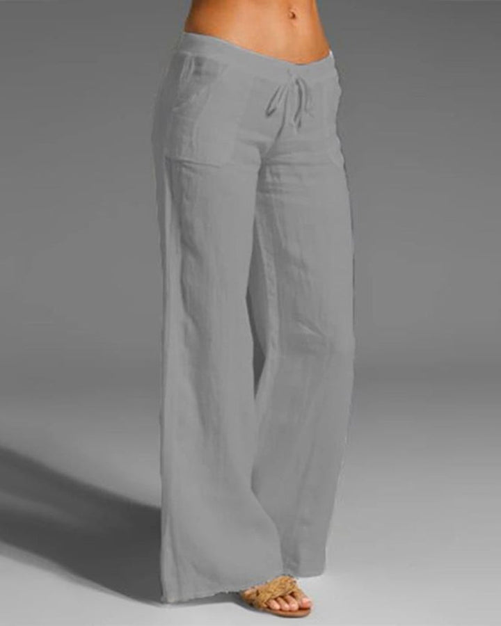 Elegante Damenhose mit weitem Bein, elastischem Bund, weichem Stoff, ideal für vielseitige Looks, in Blau und anderen Farben.