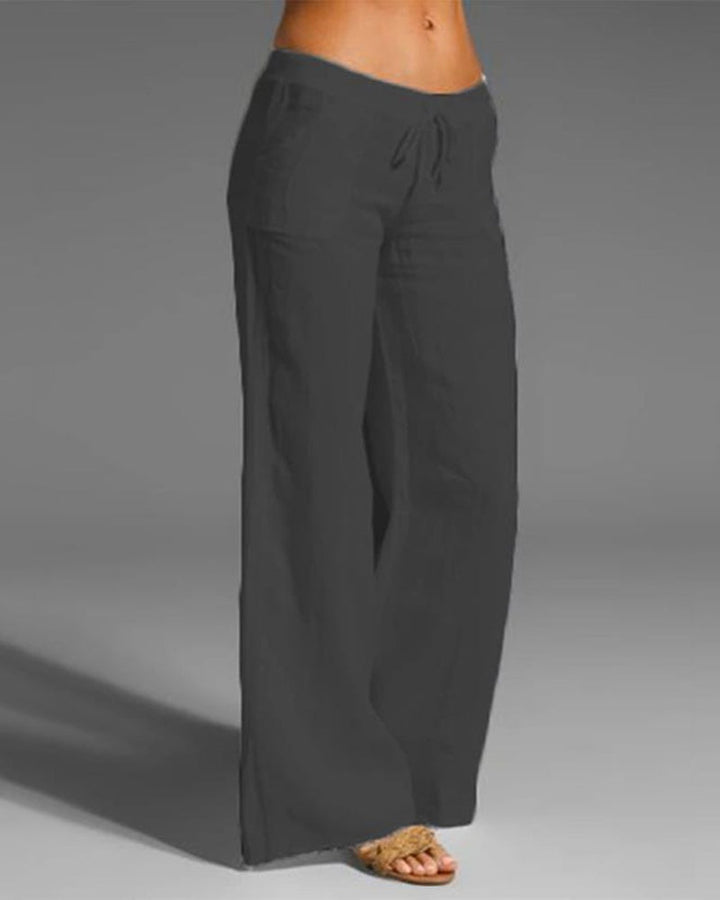 Elegante Damenhose mit weitem Bein, elastischem Bund, weichem Stoff, ideal für vielseitige Looks, in Blau und anderen Farben.