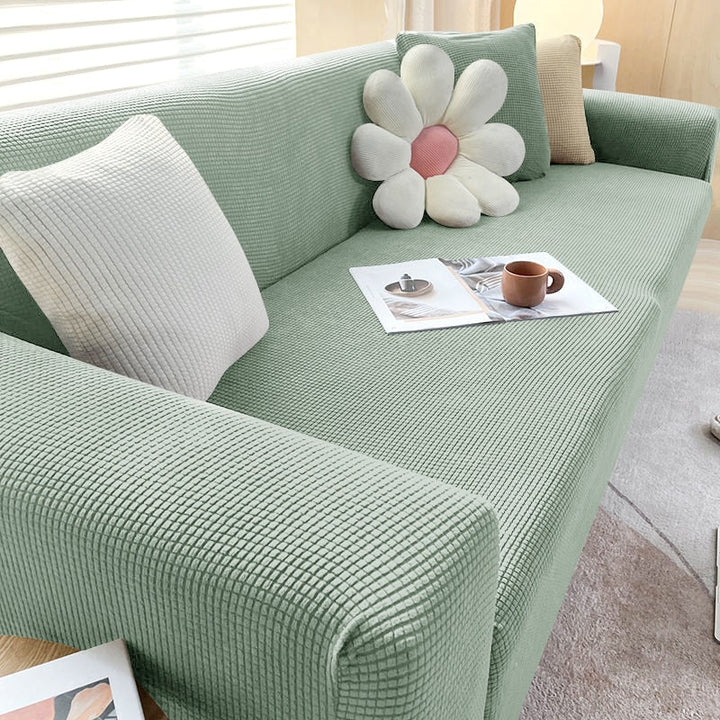 "Elegante elastische Sofahusse in modernem Design, passt perfekt auf verschiedene Sofas, schützt vor Abnutzung und Flecken."