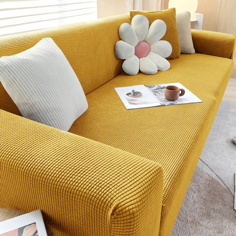 "Elegante elastische Sofahusse in modernem Design, passt perfekt auf verschiedene Sofas, schützt vor Abnutzung und Flecken."
