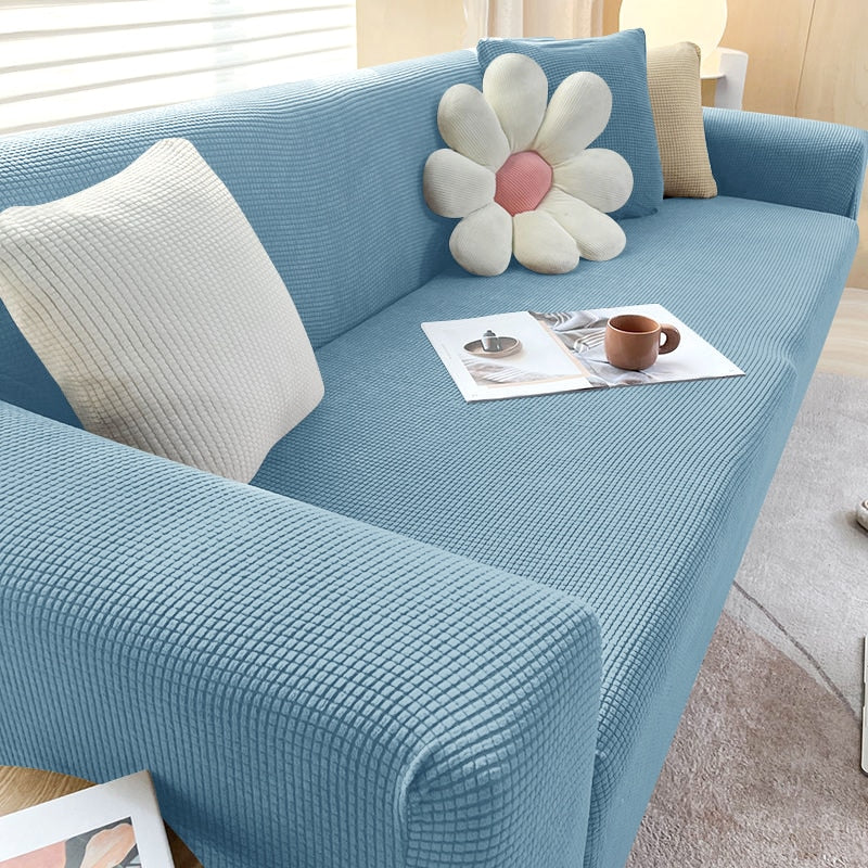 "Elegante elastische Sofahusse in modernem Design, passt perfekt auf verschiedene Sofas, schützt vor Abnutzung und Flecken."