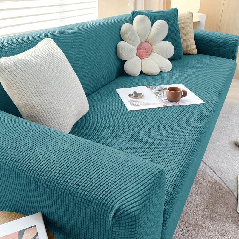 "Elegante elastische Sofahusse in modernem Design, passt perfekt auf verschiedene Sofas, schützt vor Abnutzung und Flecken."