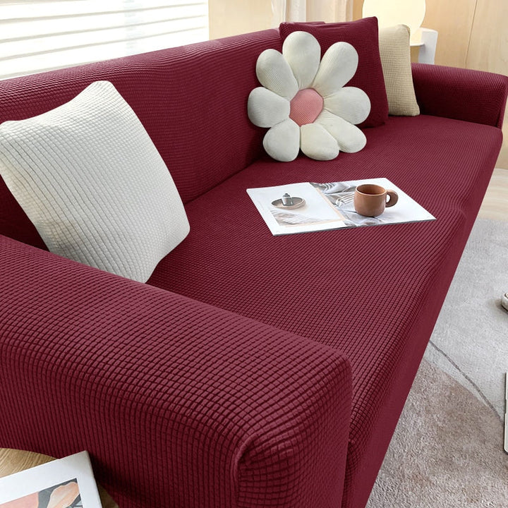 "Elegante elastische Sofahusse in modernem Design, passt perfekt auf verschiedene Sofas, schützt vor Abnutzung und Flecken."