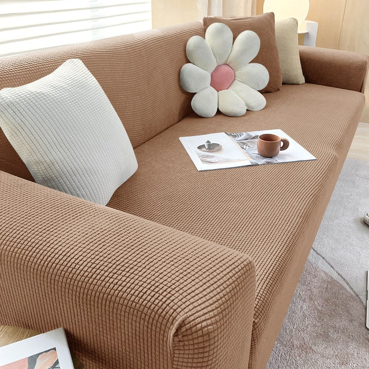 "Elegante elastische Sofahusse in modernem Design, passt perfekt auf verschiedene Sofas, schützt vor Abnutzung und Flecken."
