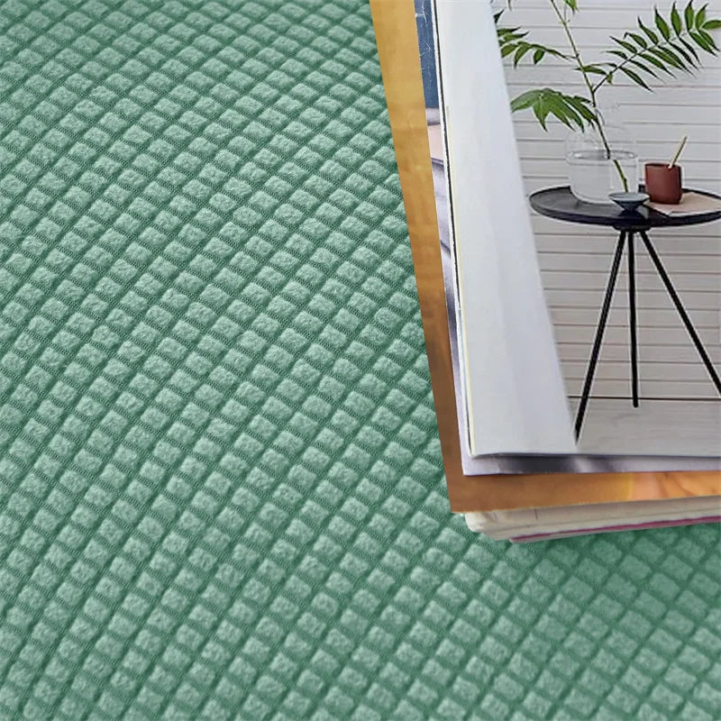 "Elegante elastische Sofahusse in modernem Design, passt perfekt auf verschiedene Sofas, schützt vor Abnutzung und Flecken."