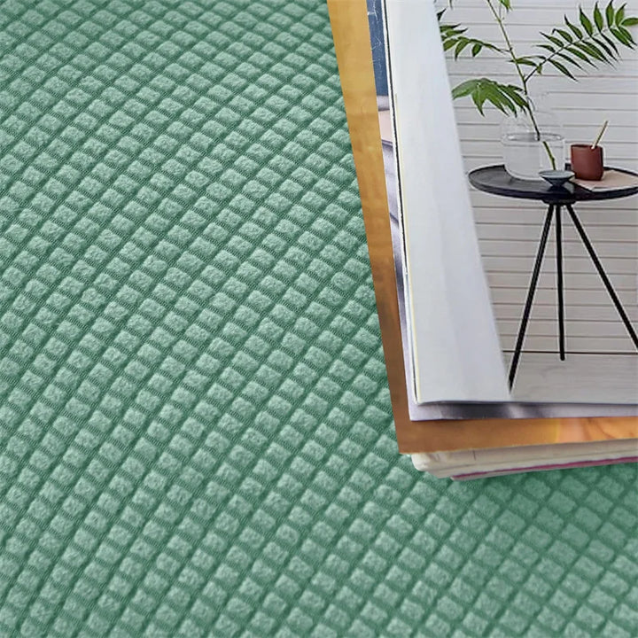 "Elegante elastische Sofahusse in modernem Design, passt perfekt auf verschiedene Sofas, schützt vor Abnutzung und Flecken."