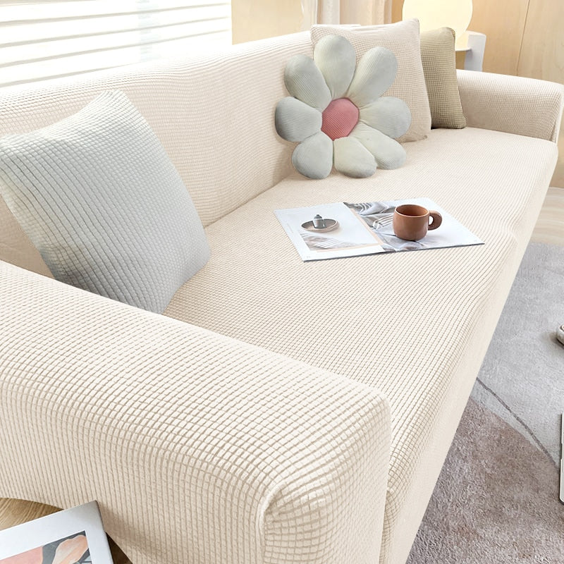 "Elegante elastische Sofahusse in modernem Design, passt perfekt auf verschiedene Sofas, schützt vor Abnutzung und Flecken."