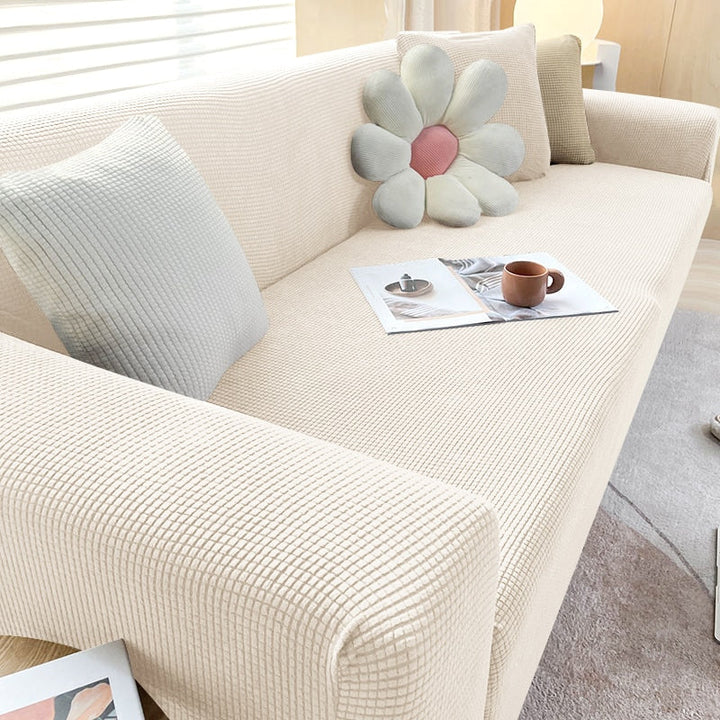 "Elegante elastische Sofahusse in modernem Design, passt perfekt auf verschiedene Sofas, schützt vor Abnutzung und Flecken."