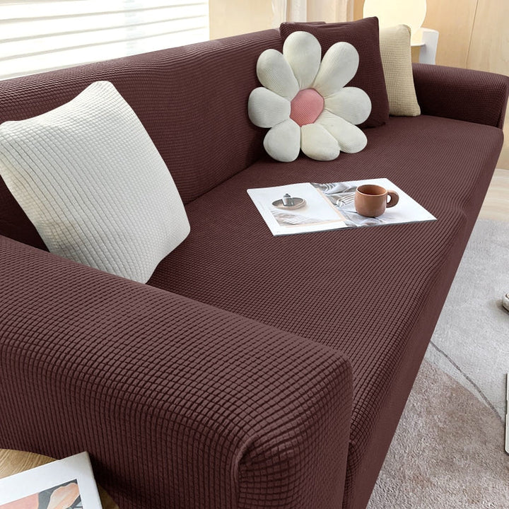 "Elegante elastische Sofahusse in modernem Design, passt perfekt auf verschiedene Sofas, schützt vor Abnutzung und Flecken."