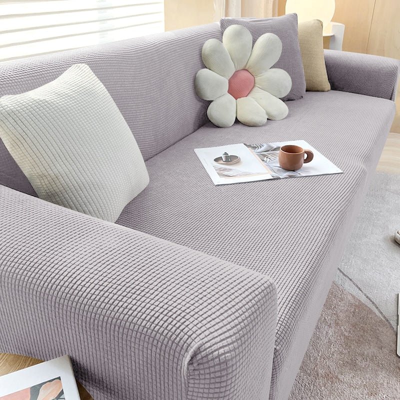"Elegante elastische Sofahusse in modernem Design, passt perfekt auf verschiedene Sofas, schützt vor Abnutzung und Flecken."