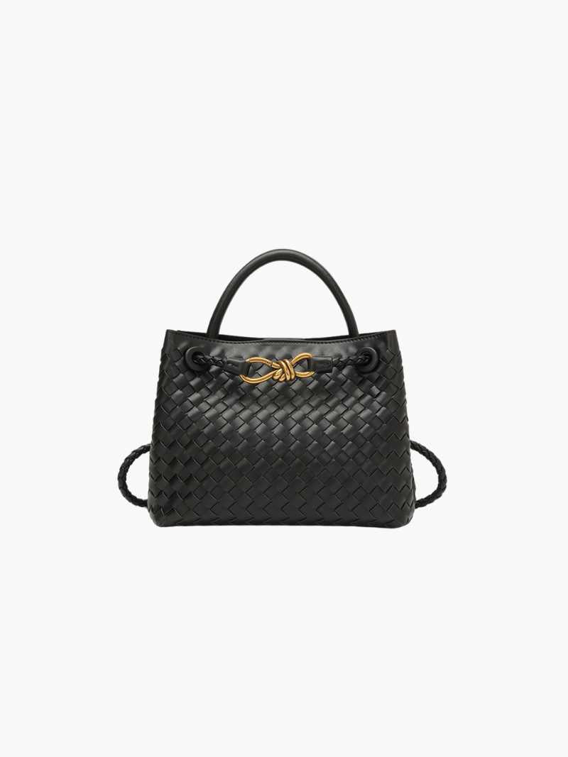 "Elegante gewebte Handtasche mit subtilem Muster, vielseitig für jeden Anlass, komfortabler Griff, stilvolle Eleganz."