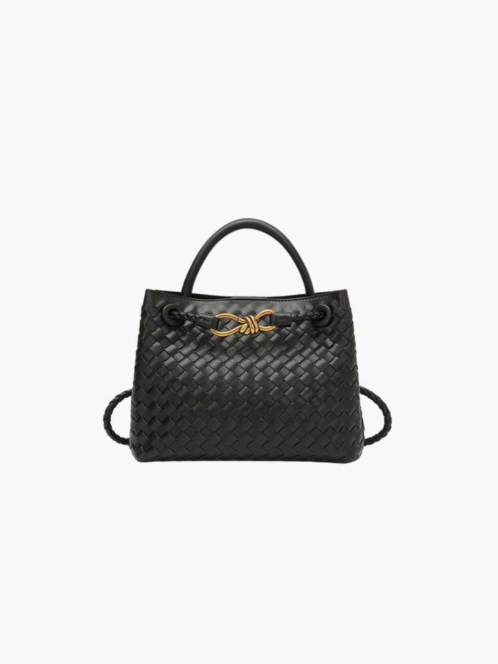 "Elegante gewebte Handtasche mit subtilem Muster, vielseitig für jeden Anlass, komfortabler Griff, stilvolle Eleganz."