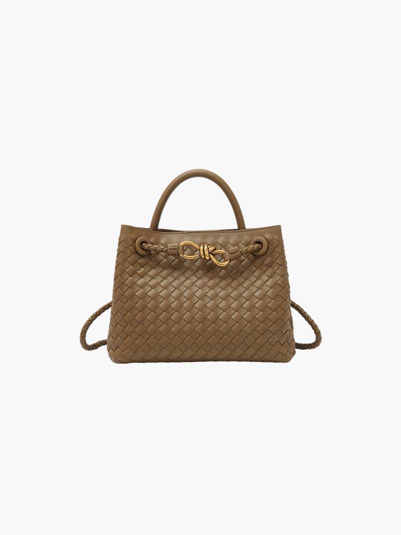 "Elegante gewebte Handtasche mit subtilem Muster, vielseitig für jeden Anlass, komfortabler Griff, stilvolle Eleganz."